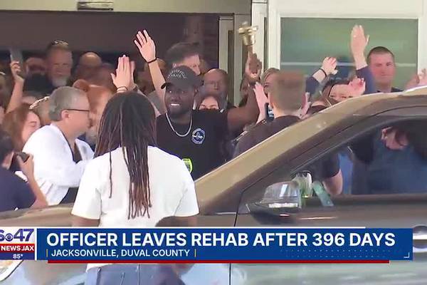 Officer who suffered severe spinal injury in shooting goes home after almost 400 days