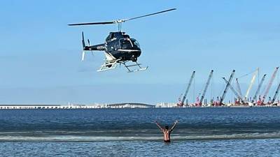 SEE: Alleged robber jumps into Tampa Bay to avoid police